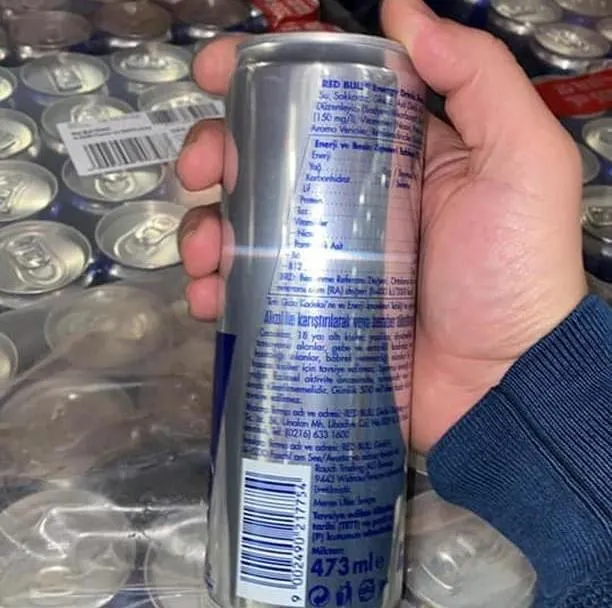 Multiple Redbull Energy Drink 250ml cans stacked