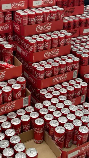 Close-up of Coca-Cola Original Taste branding on 330ml aluminum can