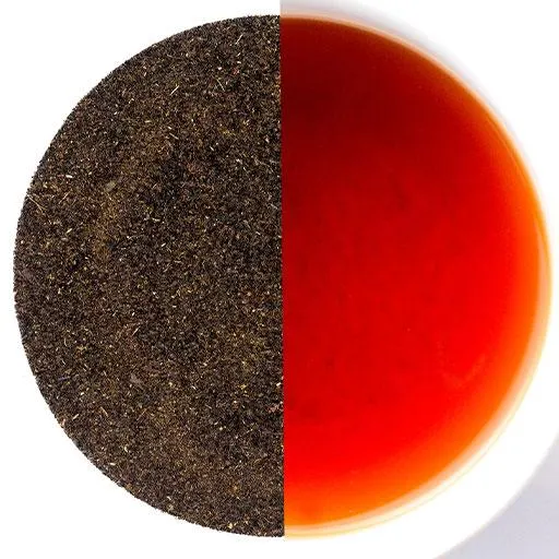 High grade Kenyan black tea pouring into a cup