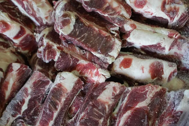 Raw pork meat displayed on tray