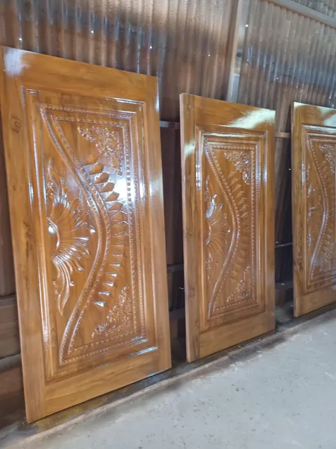 Handcrafted imported teak wood front door with elaborate carving