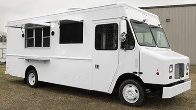 Side view of a food truck equipped with cooking facilities