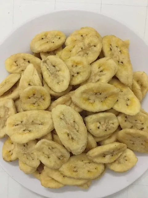 Crispy sweet banana fruit chips in bowl