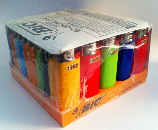 Multiple Bic lighter trays stacked for wholesale