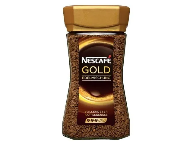 Serving Nescafe Gold Coffee in a cup