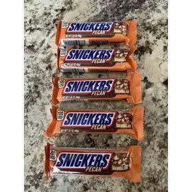 Multiple Snicker Peanut Butter Squared Bars stacked