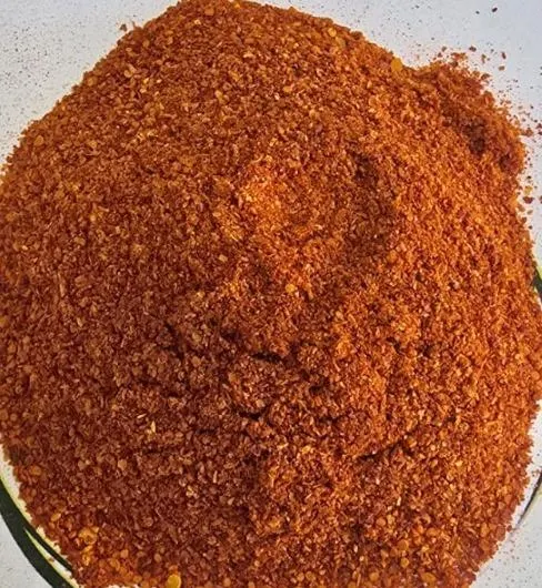 Assorted chili powder varieties in bowls