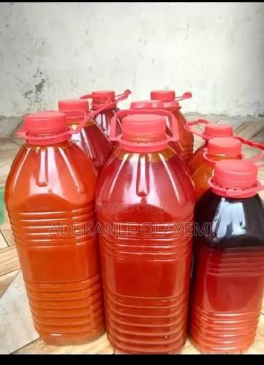 Open container with red palm oil