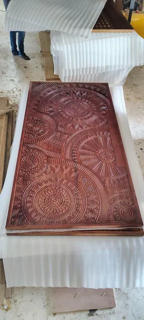 Elegant teak carving main door showcasing traditional motifs
