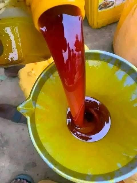 Pure Refined Red Oil Pouring Closeup