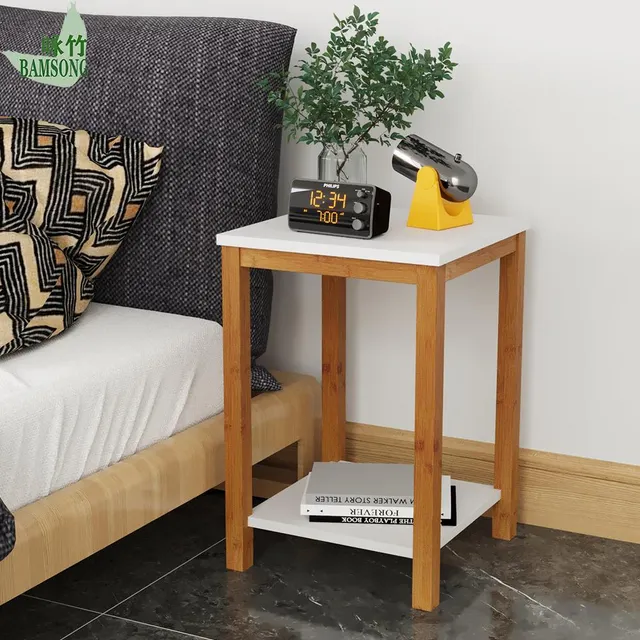 Side Table next to sofa serving as coffee side table