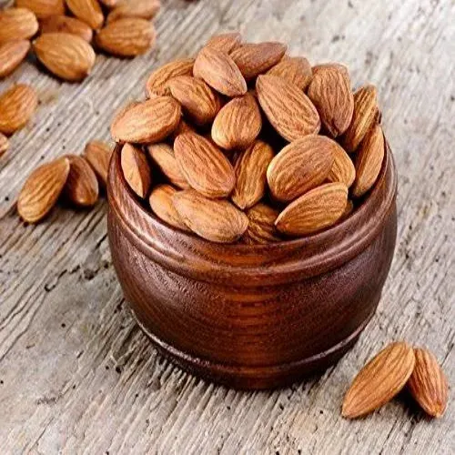 Bulk raw almonds in trays for wholesale