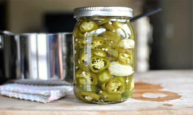 Hot Green Pickled Jalapeno Slices in Glass Bottle