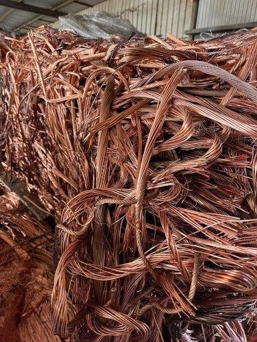 Stacked coils of Copper Wire Scrap ready for export
