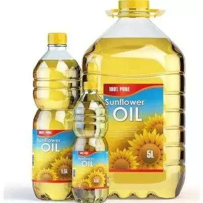 Refined sunflower cooking oil in transparent bottles on display