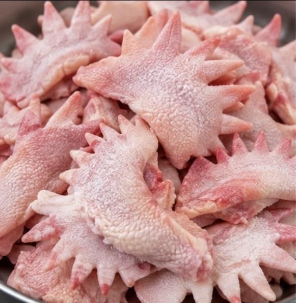 Halal certified frozen chicken combs and crests neatly packed in bulk