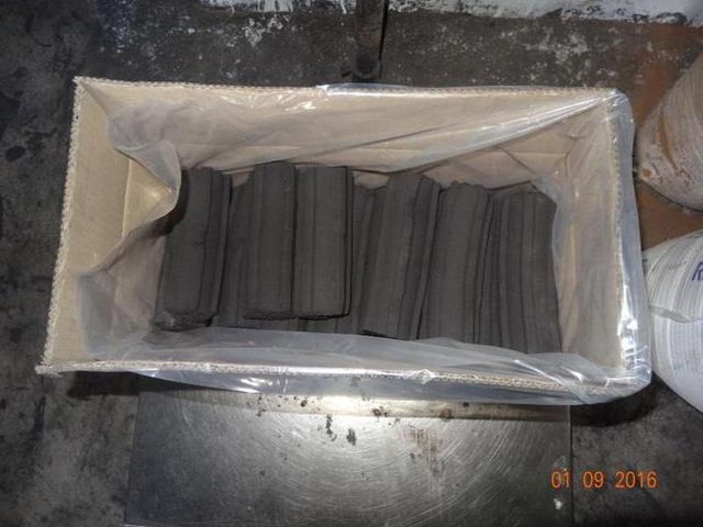 Charcoal in a BBQ container