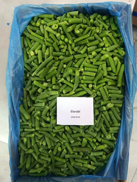 Frozen cut beans displayed in pile