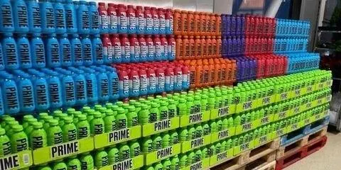 PRIME Energy Drink 500ml opened can with beverage pouring