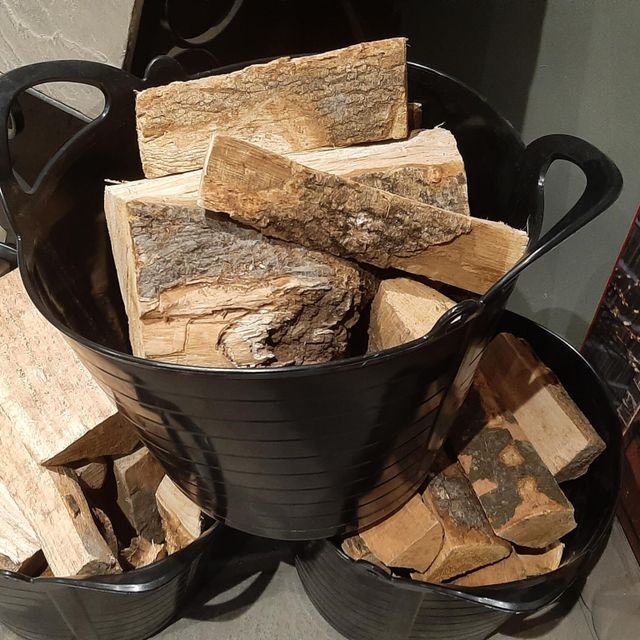 Stacked firewood bags in storage