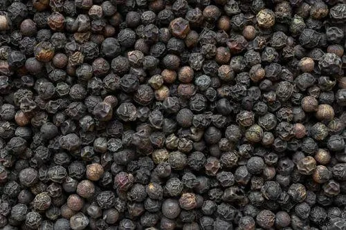 Close-up of premium black peppercorns