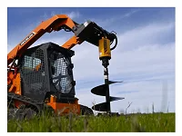 9 inch Rock Bit Skidsteer Attachment drilling setup