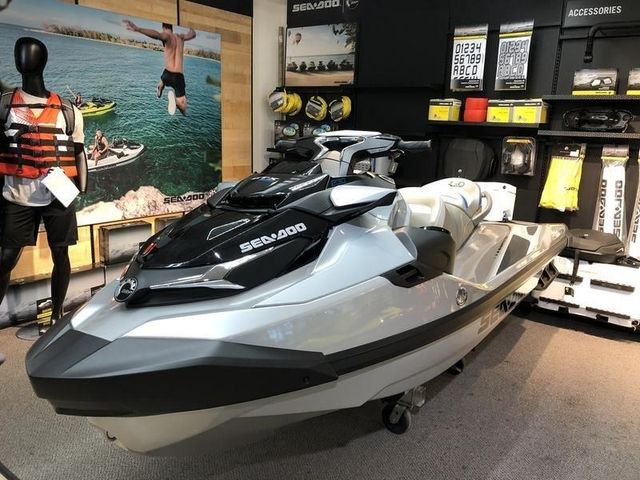 Engine closeup and watercraft features of the Sea-Doo GTX 230