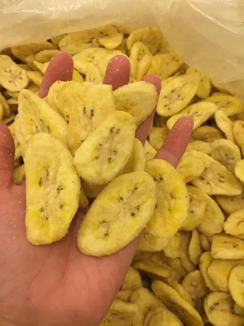 Stacked packages of dried banana slices for wholesale