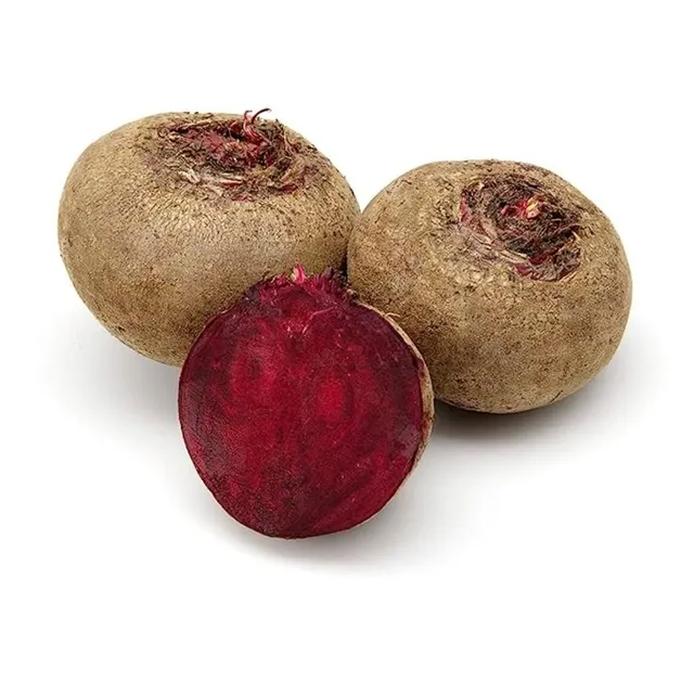 Fresh whole red beetroot with green leaves